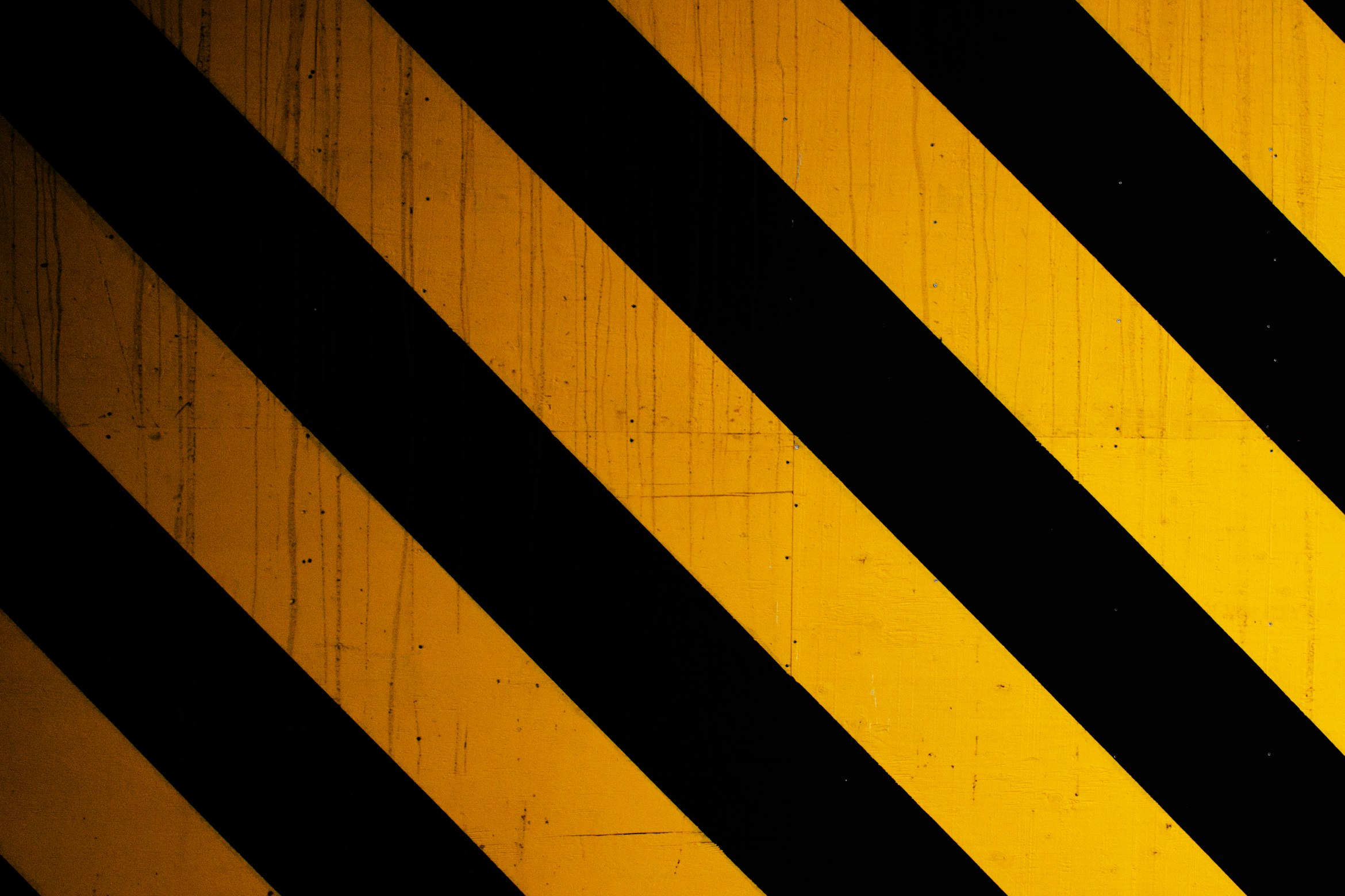 Black and yellow striped caution tape line
